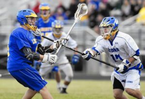 lacrosse players on the field