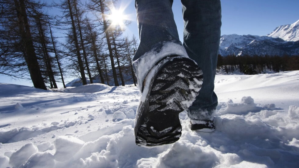 legs walking in the snow